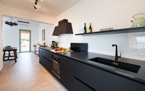 Cavial: Cabinetry, Countertop, Sink, Kitchen Sink, Tap, Kitchen, Lighting, Interior Design, Wood, Home Appliance