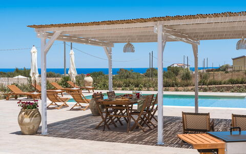 Villa Paolina: Water, Table, Plant, Sky, Furniture, Property, Building, Azure, Shade, Chair