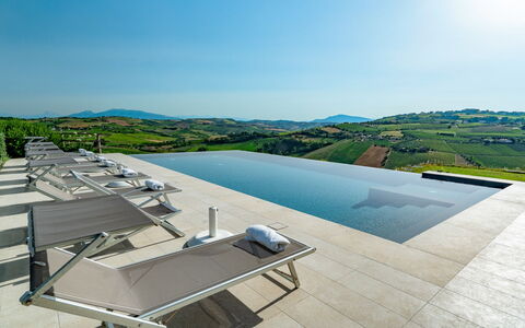 Relais Tenuta Santori: Sky, Building, Water, Outdoor Furniture, Urban Design, Condominium, Tree, Residential Area, Landscape, Swimming Pool