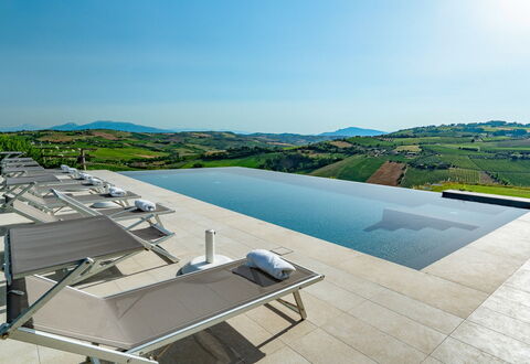 Relais Tenuta Santori: Sky, Building, Water, Outdoor Furniture, Urban Design, Condominium, Tree, Residential Area, Landscape, Swimming Pool