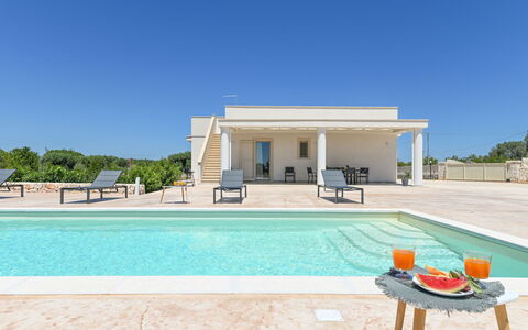 Villa Normanni: Sky, Property, Water, Azure, Shade, Leisure, Rectangle, Grass, Tree, Real Estate