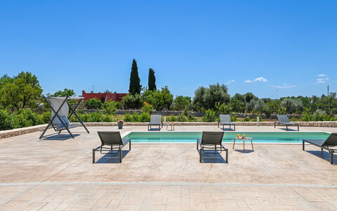 Villa Normanni: Sky, Property, Water, Tree, Outdoor Furniture, Shade, Plant, Urban Design, Landscape, Leisure