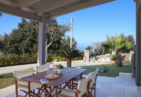 Villa Don Sante In Locorotondo Puglia: Plant, Table, Furniture, Property, Sky, Chair, Azure, Shade, Lighting, Tree