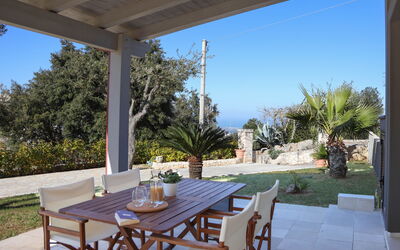 Villa Don Sante In Locorotondo Puglia: Plant, Table, Furniture, Property, Sky, Chair, Azure, Shade, Lighting, Tree