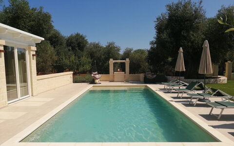 Villa Adriatica Near Ostuni Puglia: Water, Sky, Swimming Pool, Plant, Shade, Tree, Chair, Leisure, Grass, Composite Material