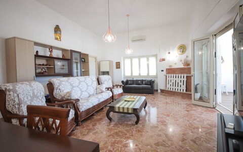 Villa Azzurra Seaview In Monopoli, Puglia: Couch, Picture Frame, Furniture, Property, Table, Building, Interior Design, Wood, Living Room, House