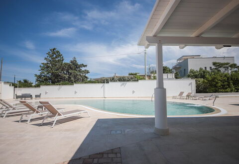 Villa Azzurra Seaview In Monopoli, Puglia: Water, Sky, Cloud, Plant, Swimming Pool, Tree, Shade, Leisure, Composite Material, Landscape