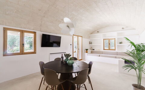 Villa Jolie: Flooring, Interior Design, Furniture, Ceiling, Floor, Lighting, Room, Light Fixture, Chair, Living Room