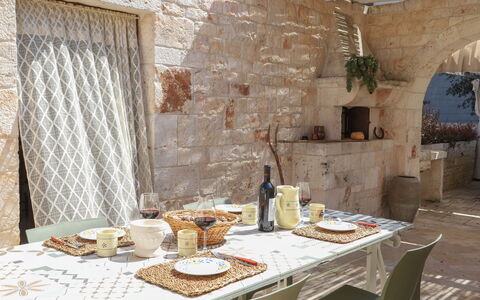 Country Trullo Rosso With Jacuzzi Alberobello: Table, Property, Tableware, Food, Wood, Interior Design, Bottle, Tablecloth, Floor, Curtain