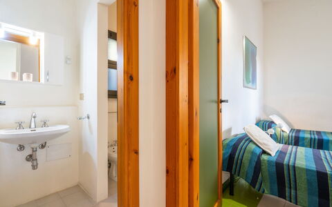 Capo Boi: Mirror, Sink, Building, Tap, Plumbing Fixture, Bathroom Sink, Bathroom, Comfort, Lighting, Interior Design