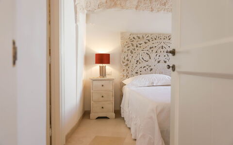 Country Trullo Verde, Wifi, Alberobello: Furniture, Comfort, Building, Lamp, Wood, Bed Frame, Cabinetry, Interior Design, Pillow, Drawer