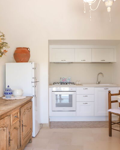 Country Trullo Verde, Wifi, Alberobello: Cabinetry, Furniture, Property, Countertop, Drawer, Orange, Interior Design, Wood, Sink, Building