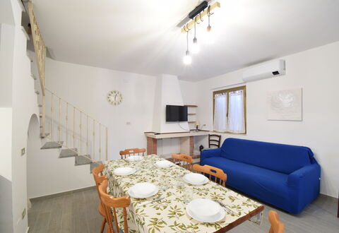 Casa Rosada With Outdoor In Budoni: Table, Property, Furniture, Picture Frame, Couch, Wood, Interior Design, Chair, Lighting, Architecture