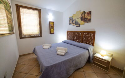 Trilocale 3: Floor, Flooring, Apartment, Wood Stain, Bed, Bedroom, Hardwood, Bed Frame, Hotel, Bedding