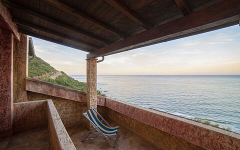 Villetta Seaside Sardegna: Wood, Sea, Ocean, Coastal And Oceanic Landforms, Coast, Balcony, Wood Stain, Bay, Tropics, Beach