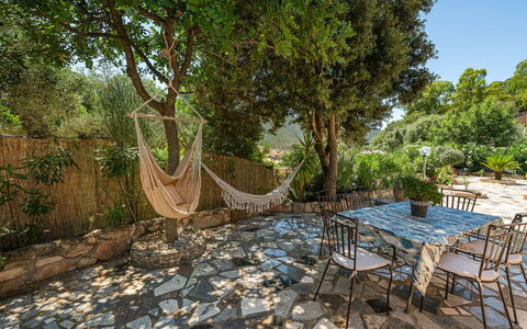 Doxina: Furniture, Outdoor Furniture, Flagstone, Chair, Garden, Shade, Backyard, Landscaping, Outdoor Table, Flowerpot