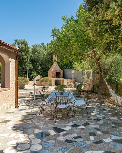 Doxina: Furniture, Flagstone, Outdoor Furniture, Chair, Garden, Patio, Backyard, Tile, Landscaping, Flowerpot