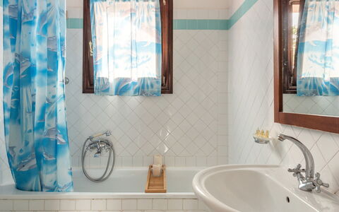 Apartments With Pool Country Village, Stintino: Blue, Bathroom, Plumbing Fixture, Interior Design, Bathtub, Flooring, Mirror, Tap, Floor, Plumbing