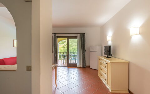 Apartments With Pool Country Village, Stintino: Interior Design, Ceiling, Flooring, Floor, Room, Wood Stain, Hardwood, Home Appliance, Kitchen & Dining Room Table, Living Room