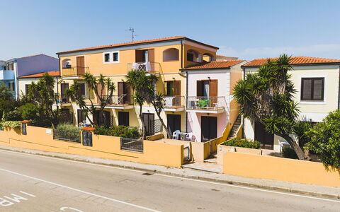 Casa Pavoncelle Apartments In Gallura: Building, Window, Residential Area, Town, Facade, Neighbourhood, House, Home, Urban Design, Human Settlement
