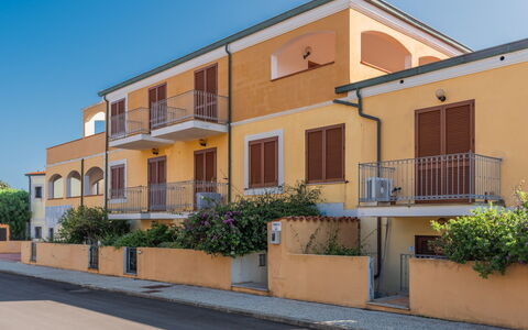 Casa Pavoncelle Apartments In Gallura: Residential Area, Human Settlement, Balcony, Apartment, Fence