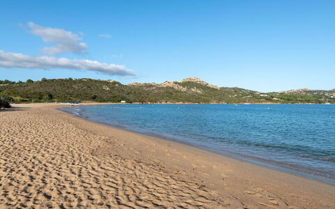 Casa D'orso Green Village Sardegna: Water, Cloud, Sky, Water Resources, Azure, Beach, Tree, Natural Landscape, Coastal And Oceanic Landforms, Bank