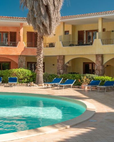 Casa Faro Green Village Sardegna: Water, Plant, Building, Property, Window, Azure, Architecture, Tree, Sky, Leisure