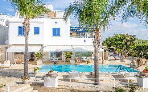 Villa Solemare: Blue, Swimming Pool, Outdoor Furniture, Umbrella, Resort, Chair, Shade, Sunlounger, Estate, Hotel
