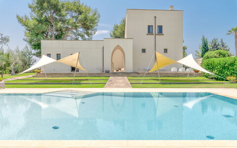 Masseria Ceratonia: Swimming Pool, Shade, Estate, Landscaping, Lawn, Hacienda, Villa, Artificial Turf, Courtyard, Eco Hotel