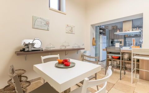 Masseria Ceratonia: Furniture, Interior Design, Flooring, Floor, Ceiling, Room, Chair, Lighting, Table, Kitchen