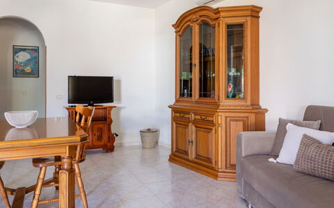 Remo: Furniture, Interior Design, Flooring, Wood, Floor, Room, Living Room, Cabinetry, Lighting, Home