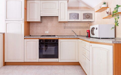 Remo: Kitchen, Cabinetry, Major Appliance, Wood, Kitchen Appliance, Interior Design, Countertop, Furniture, Flooring, Cupboard