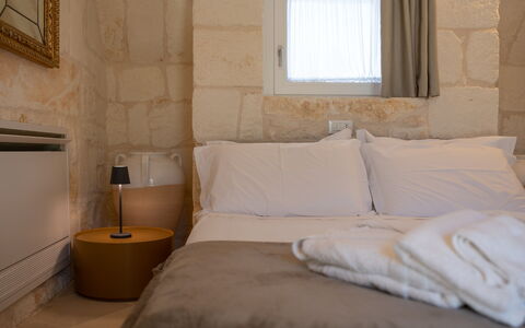 Trullo Brenda: Interior Design, Bedroom, Bed Sheet, Bedding, Bed, Ceiling, Bed Frame, Linens, Pillow, Throw Pillow