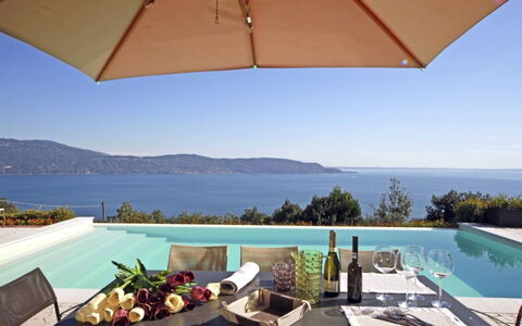 Villa le Selve: Furniture, Water, Body Of Water, Outdoor Furniture, Chair, Table, Umbrella, Sea, Coastal And Oceanic Landforms, Shade
