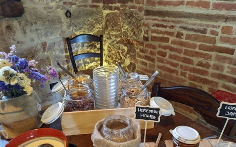 Podere della Bruciata: Furniture, Restaurant, Chair, Wood Stain, Serveware, Dishware, Food, Shelving, Kitchen & Dining Room Table, Dining Room