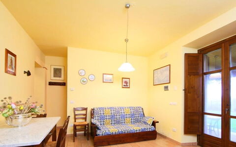 Podere dei Limoni: Interior Design, Furniture, Flooring, Wood, Floor, Ceiling, Room, Apartment, Living Room, Chair