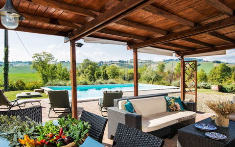 Cascina Tabia: Furniture, Swimming Pool, Outdoor Furniture, Resort, Chair, Eco Hotel, Outdoor Table, Shade, Patio, Flowerpot