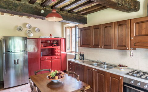 Cascina Arcangelo: Kitchen, Furniture, Cabinetry, Kitchen Appliance, Countertop, Flooring, Interior Design, Wood, Major Appliance, Ceiling