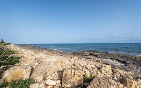 Villa delle Palme: Sky, Blue, Water, Body Of Water, Horizon, Coast, Rock, Sea, Beach