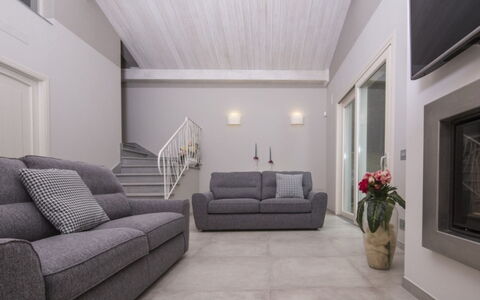 Villa Sara: Furniture, Interior Design, Flooring, Couch, Floor, Ceiling, Room, Living Room, Lighting, Apartment