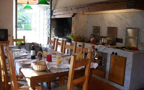 Villa Antonella: Furniture, Wood, Kitchen, Interior Design, Kitchen & Dining Room Table, Table, Flooring, Countertop, Chair, Ceiling