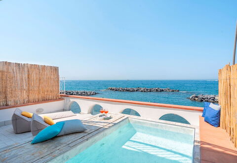 Villa Luce: Blue, Sea, Ocean, Resort, Shade, Coast, Beach, Outdoor Furniture, Hotel, Swimming Pool