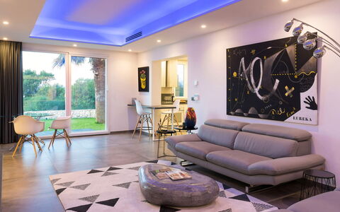 Villa Vernissage: Furniture, Interior Design, Flooring, Floor, Couch, Ceiling, Living Room, Home, Lighting, Table