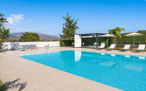Villa Contemporanea: Swimming Pool, Water, Furniture, Outdoor Furniture, Resort, Chair, Composite Material, Shade, Eco Hotel, Umbrella