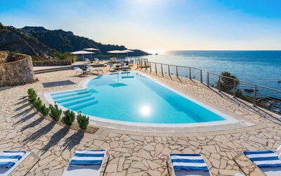 Villa Taormina- Baya Bella: Blue, Water, Body Of Water, Swimming Pool, Coastal And Oceanic Landforms, Sea, Coast, Resort, Beach, Outdoor Furniture