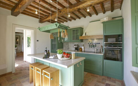 Villa Eline: Kitchen, Interior Design, Furniture, Flooring, Cabinetry, Wood, Countertop, Ceiling, Floor, Light Fixture