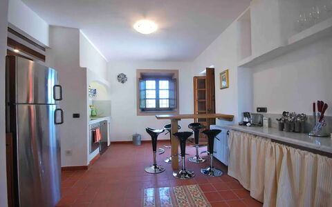 Villa Sarzana: Interior Design, Furniture, Flooring, Kitchen, Ceiling, Wood, Kitchen Appliance, Countertop, Floor, Light Fixture