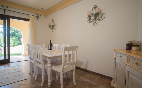 Porto Cervo Apartments Wifi And Ac: Furniture, Interior Design, Flooring, Wood, Floor, Table, Kitchen & Dining Room Table, Dining Room, Room, Chair