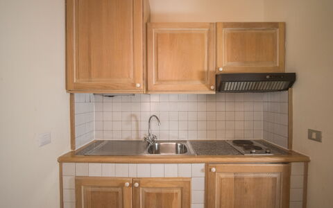 Porto Cervo Apartments Wifi And Ac: Kitchen, Countertop, Kitchen Appliance, Wood, Major Appliance, Cabinetry, Kitchen Sink, Sink, Flooring, Plumbing Fixture