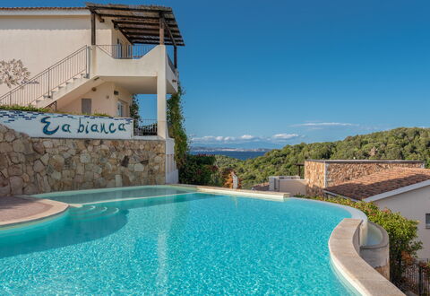 Baia Bianca Apartments Sardinia: Blue, Swimming Pool, Residential Area, Resort, Eco Hotel, Estate, Villa, Resort Town, Hotel, Outdoor Furniture